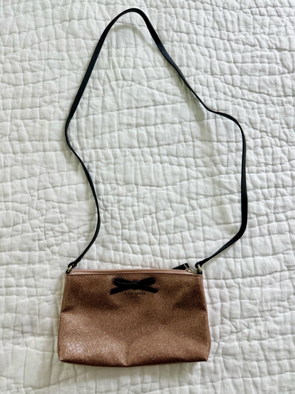 kate spade rose gold glitter crossbody with black strap